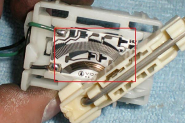 showing the resistive card of an old fuel sender